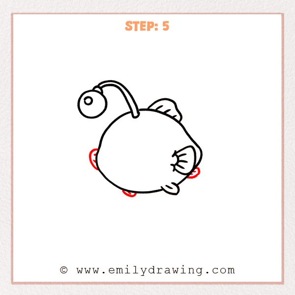 how to draw an angler fish - Step 5: A small left fin is added to balance the angler fish body.